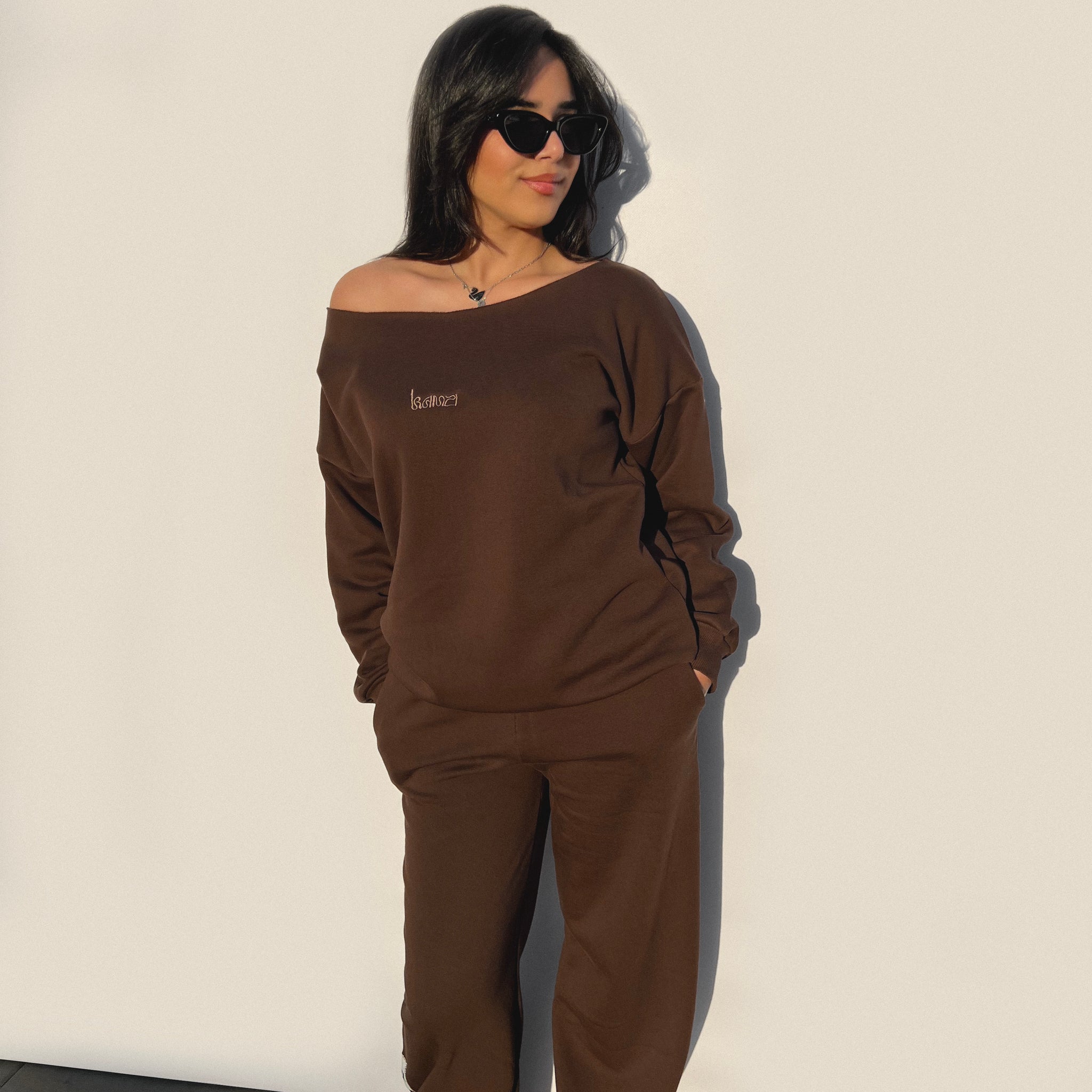 brown no neckline sweater