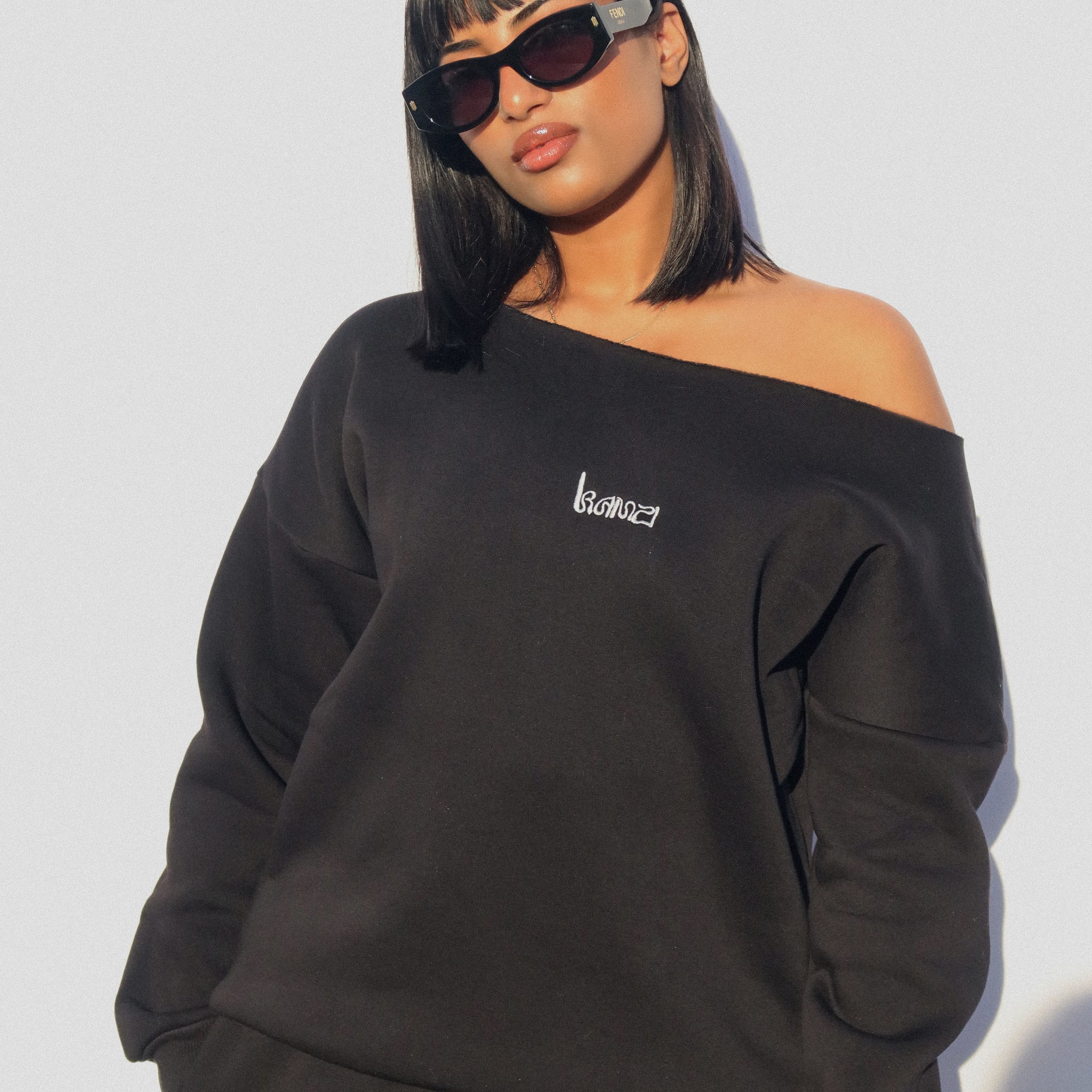 black no neckline sweater