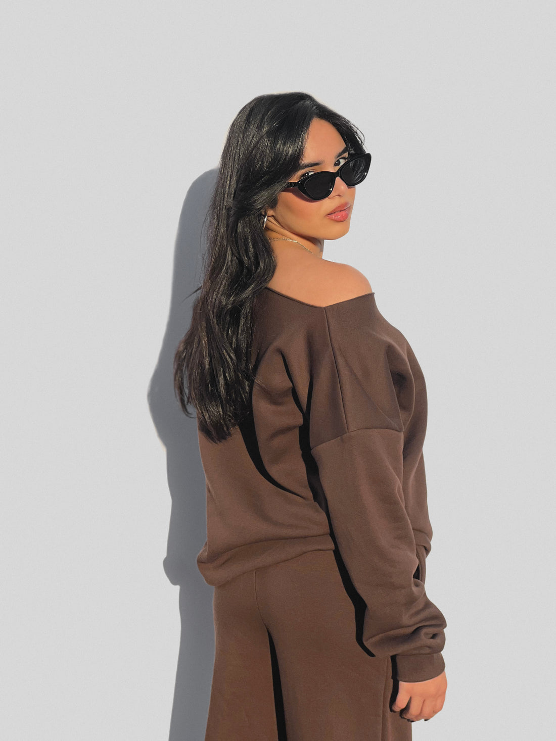 brown no neckline sweater